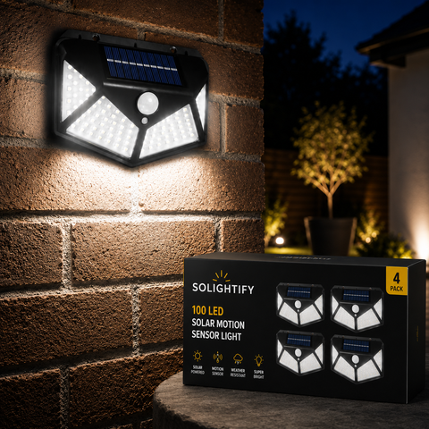 Solar motion sensor light attached to a brick wall with its packaging in the foreground.