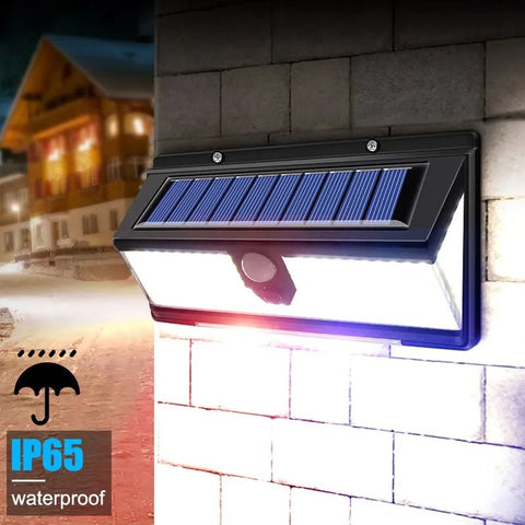 Solightify 190 LED outdoor PIR motion sensor solar security wall light waterproof garden lamp on exterior wall.
