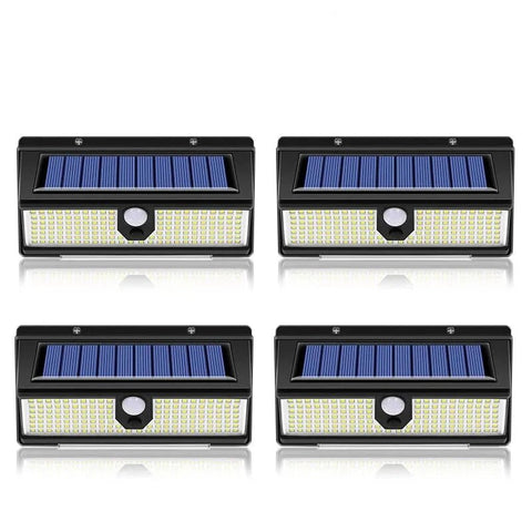Solightify 190 LED outdoor PIR motion sensor solar security wall light waterproof garden lamp mounted on exterior wall at night