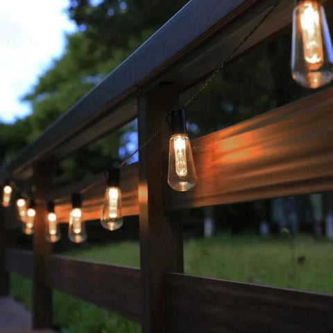 Outdoor solar string festoon lights with 30 Edison bulbs, 9.8m length, 8 lighting modes, and remote control by Solightify.