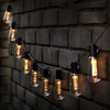Solightify solar festoon string lights with 30 Edison bulbs, 9.8m length, 8 lighting modes, remote control for outdoor ambiance.