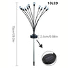 Solightify waterproof solar garden fairy lights with 10 flickering LED bulbs hanging along a garden path on a night.