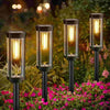 Four waterproof solar garden lights by Solightify with square-shaped design and sensor-powered illumination.
