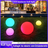 Solightify LED Mood Light Sphere solar garden light with 16 colors, 4 modes, remote control, and USB charging in a garden setting.