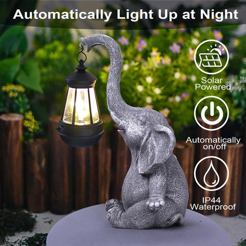 Grey solar elephant garden lantern by Solightify, decorative solar light with intricate elephant design for outdoor illumination.