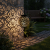 Black Moroccan solar hanging lantern by Solightify, waterproof outdoor lantern with shadow projecting design for garden lighting.