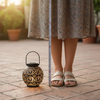 Black solar Moroccan hanging lantern by Solightify, waterproof outdoor light with shadow projecting design, perfect for garden decor.