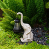 Solar-powered elephant lantern by Solightify, decorative white waterproof outdoor garden light with antique style.
