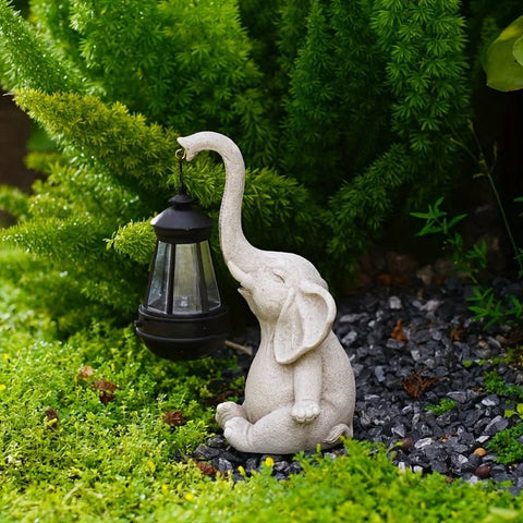 Solar-powered elephant lantern by Solightify, decorative white waterproof outdoor garden light with antique style.