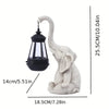 White solar-powered elephant lantern by Solightify, decorative and waterproof outdoor garden light with antique style.